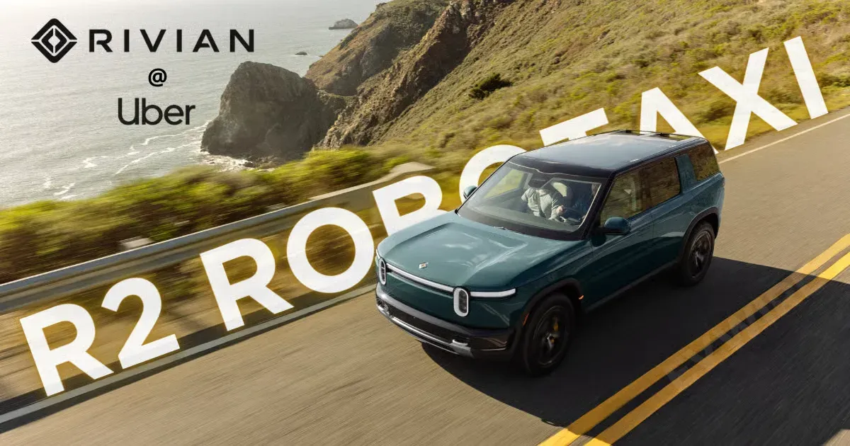 A Rivian R2 on a coast road, with the Rivian and Uber logos and the words R2 Robotaxi